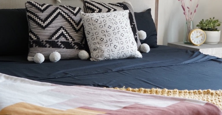 How to accentuate bold sheet choices, like black bed sheets