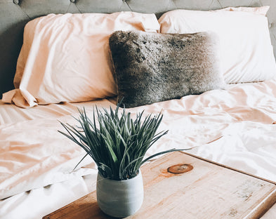 A made bed with PeachSkinSheets!